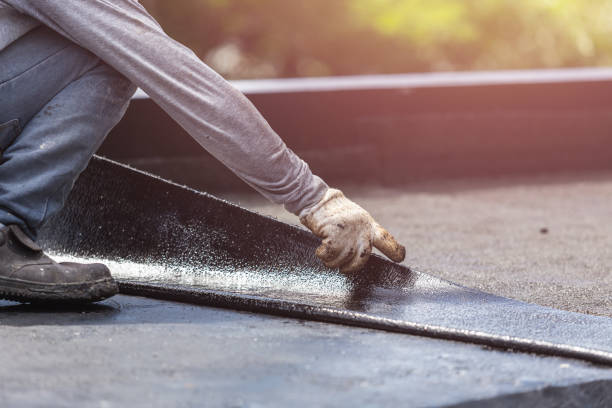 Professional Waterproofing technician working in East Meadow, NY
